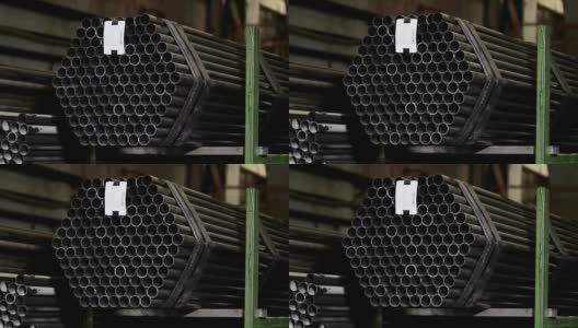 工业仓库上成排的金属管高清在线视频素材下载