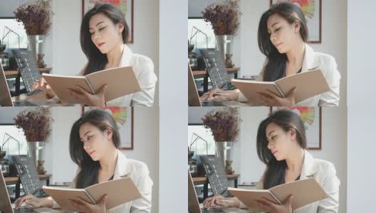 4K视频，忙碌的商务女性用笔记本电脑和笔记本工作在咖啡馆咖啡厅的早上，商务人士的生活方式。30多岁的亚洲模特高清在线视频素材下载