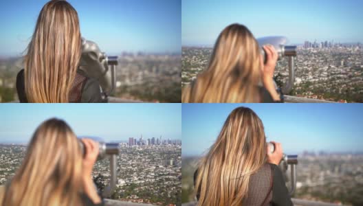 时尚女游客通过双筒望远镜看城市天际线高清在线视频素材下载