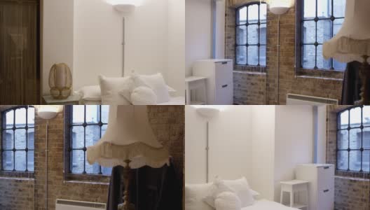 卧室区域在现代时尚公寓拍摄的R3D高清在线视频素材下载