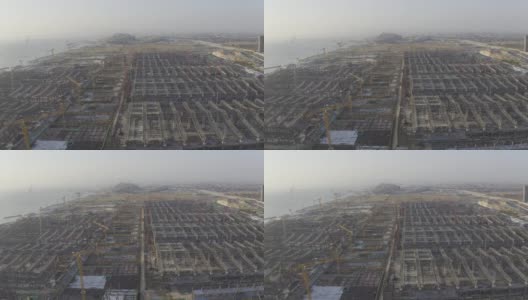 一个大型城市建筑群的施工现场的航拍视频高清在线视频素材下载