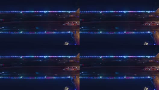 夜晚照亮三亚河交通大桥航拍全景，时间跨度为4k中国高清在线视频素材下载