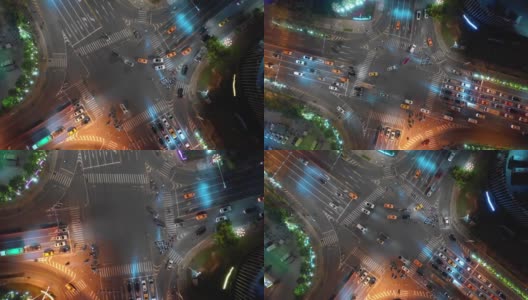 夜晚照亮三亚市交通街道十字路口高空俯视图4k中国海南高清在线视频素材下载