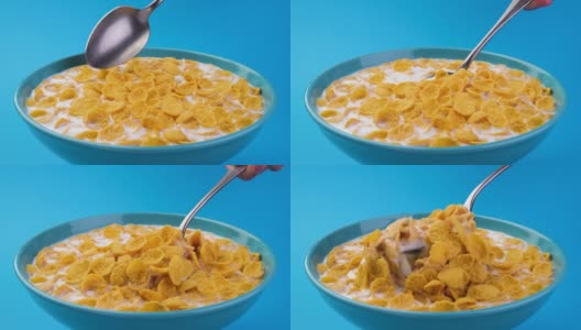 用勺子舀玉米片，健康的麦片早餐高清在线视频素材下载