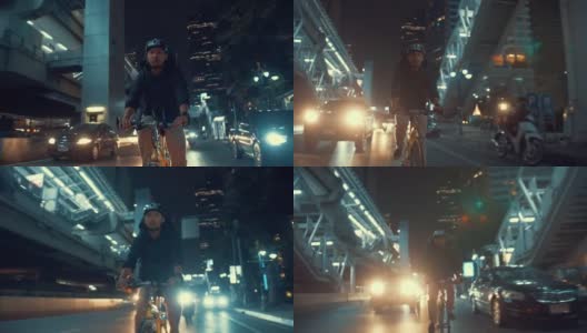 亚洲男人晚上骑自行车送货高清在线视频素材下载