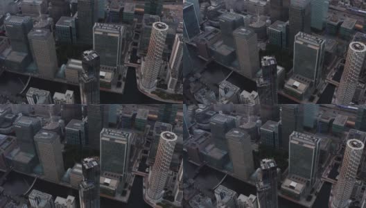市区摩天大楼的幻灯片和平移镜头。现代未来商业、金融和经济中心金丝雀码头。英国伦敦高清在线视频素材下载