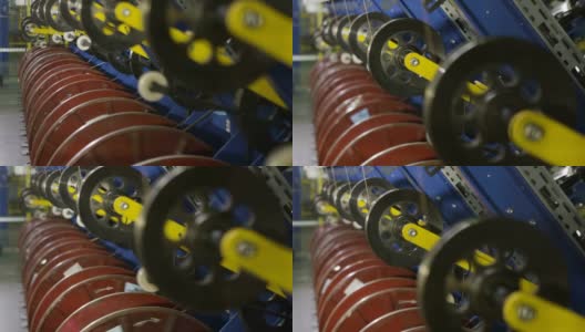 轮胎厂的纺丝金属线轴生产线高清在线视频素材下载