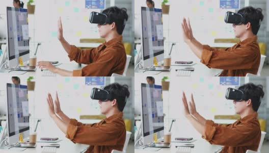 VR应用测试，亚洲年轻男性开发者在创意办公室与虚拟现实模拟器应用测试，ux, ui startup, small business concept高清在线视频素材下载
