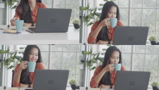 亚洲女商人微笑着喝咖啡，用笔记本电脑与她的团队在隔离期间进行视频通话。高清在线视频素材下载