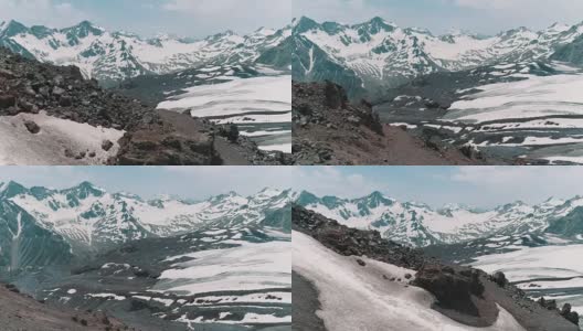 航拍美丽的自然雪山山峰景观高清在线视频素材下载