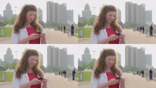 在底特律用智能手机拍摄的慢镜头褐发女郎高清在线视频素材下载