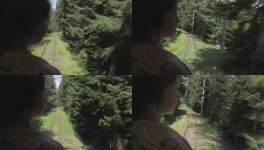 从森林里最后一辆马车上望着铁路的女孩——佐治亚高清在线视频素材下载