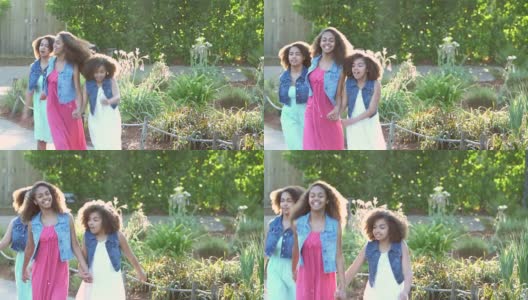 三个非洲裔美国姐妹在公园里蹦蹦跳跳高清在线视频素材下载