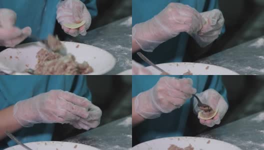 人们在工厂里用肉包饺子高清在线视频素材下载