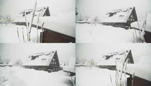 侧视图:白川村的日本大房子被雪覆盖高清在线视频素材下载