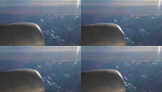 晴天飞行飞机引擎乘客窗口查看全景4k中国高清在线视频素材下载