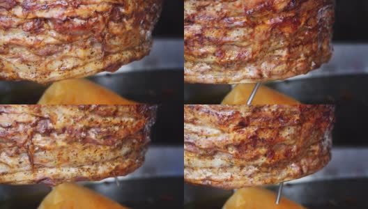 烤沙瓦玛，把肉串在烤肉串上高清在线视频素材下载