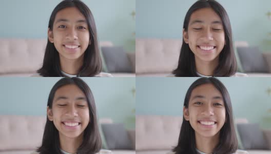 肖像亚洲女孩在家里快乐的微笑高清在线视频素材下载