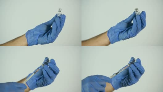男人的手，戴着蓝色乳胶手套，用注射器从装有液体的瓶子里提取液体高清在线视频素材下载