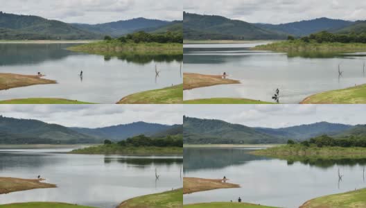 湖面上有站立式桨板的游客高清在线视频素材下载
