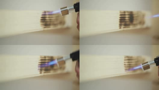 DIY -暗/燃烧木框架与喷灯高清在线视频素材下载