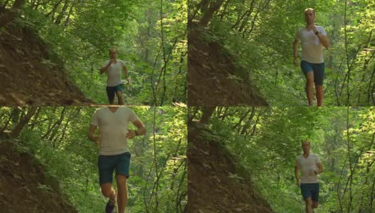 在森林里，奔跑者接近摄像机。超级慢动作长镜头高清在线视频素材下载