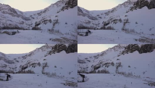 冬季阿尔卑斯山景观从红色火车贝尔尼纳铁路高清在线视频素材下载
