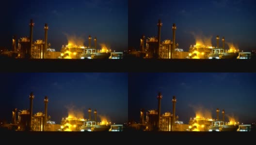 夜景工业发电厂和石油化工厂。4K分辨率高清在线视频素材下载