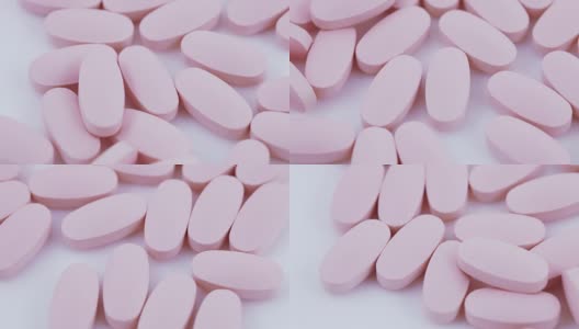 椭圆形的粉红色药片在盘子里高清在线视频素材下载