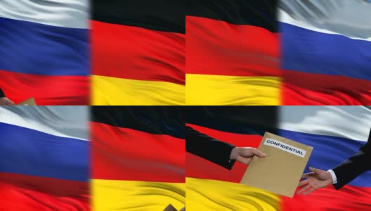 俄罗斯和德国官员交换机密信封，旗帜背景高清在线视频素材下载