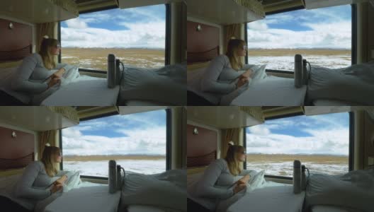 近距离观察:一名快乐的白人妇女从她的头等舱的窗户往外看高清在线视频素材下载