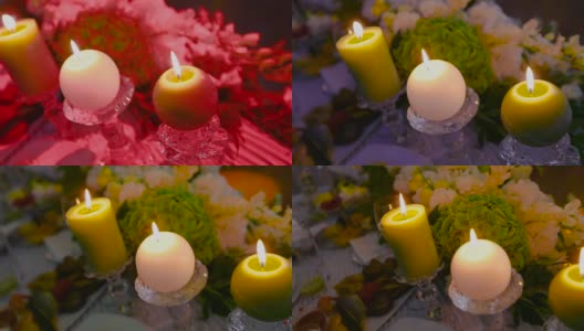 婚礼装饰，玻璃瓶里的蜡烛。烛台上的婚礼蜡烛高清在线视频素材下载