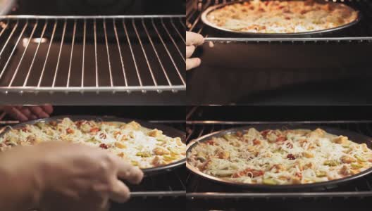 烤箱里烤着自制的意大利披萨。近距离微距镜头高清在线视频素材下载