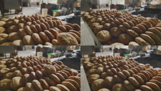 慢镜头60帧(fps)拍摄马来西亚东部美里一家专门制作不同月饼的饼干工厂里的中国烤面包高清在线视频素材下载