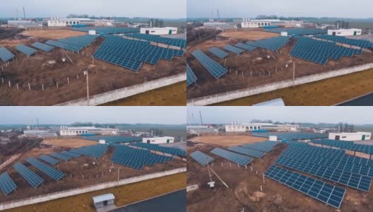 太阳能发电厂在农村。创新光伏太阳能电池的领域。生产清洁能源。鸟瞰图。高清在线视频素材下载