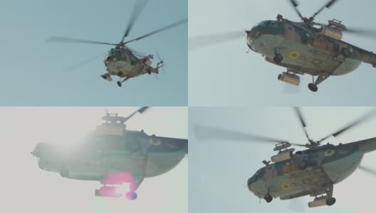 军用直升机在蓝天下飞行高清在线视频素材下载