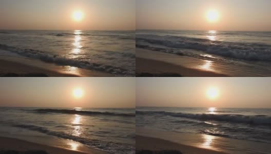 海面上的日出景观。海滩上金色的日出。海洋的日出。平静海洋上的日出。大西洋清晨的日出高清在线视频素材下载