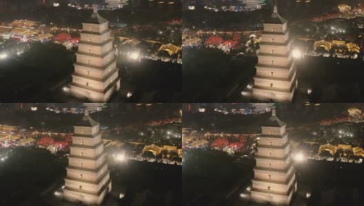 陕西西安大雁塔景区夜间鸟瞰图及城市天际线高清在线视频素材下载