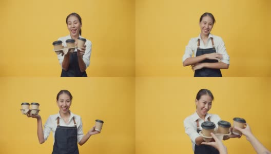快乐微笑的亚洲女服务员正准备为顾客点菜，同时看着隔离在黄色背景上的相机。高清在线视频素材下载
