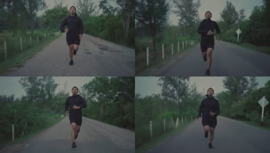 黄昏时在街上跑步的男性高清在线视频素材下载