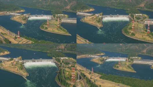 俄勒冈州(约2021年):哥伦比亚河峡谷上博纳维尔水坝的鸟瞰图。用直升机用RED 8K拍摄的Cineflex。高清在线视频素材下载