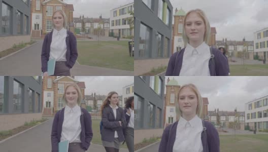 校园肖像16岁的学生和路过的女孩高清在线视频素材下载