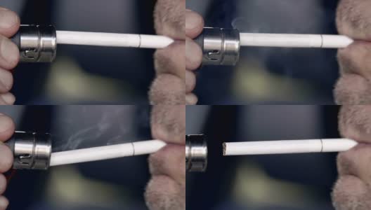 一名男子用打火机点烟。特写镜头。景深浅高清在线视频素材下载