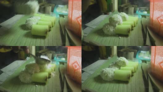 印尼传统小吃叫“Putu Cake”或“Kue Putu”在芭蕉叶上高清在线视频素材下载