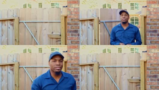 非裔美国蓝领工人带着准备工作的工具穿过后院大门高清在线视频素材下载