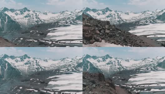 航拍的风景如画的自然雪山岩石景观高清在线视频素材下载