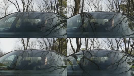 驾驶汽车正面视图/镜头。——挡风玻璃高清在线视频素材下载