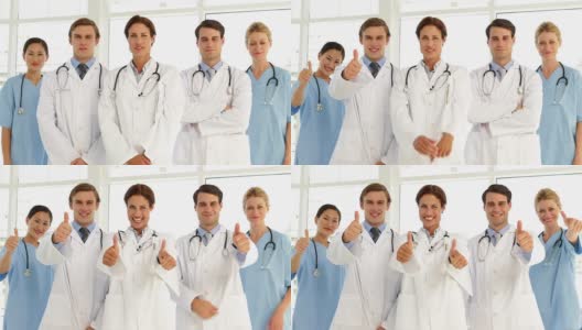 自信的医疗团队看着摄像机，竖起大拇指高清在线视频素材下载