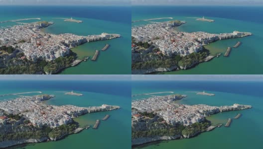 波利尼亚诺滨海阿普利亚市海岸线白色房屋和城堡在意大利无人机飞行高清在线视频素材下载