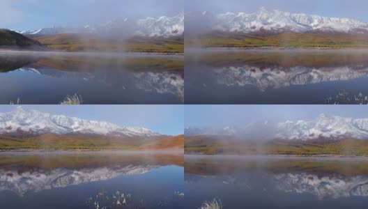 埃希提克尔高原上的阿尔泰湖。北翠脊倒映在水中高清在线视频素材下载